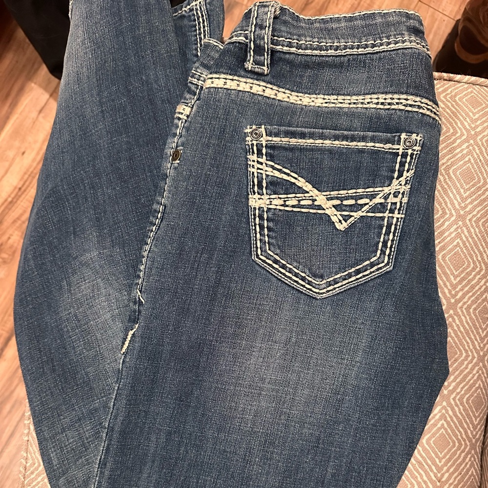 Rock n roll cowgirl jeans size 28x34.. Boot cut